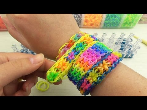 Видео: Браслет Звездочка. Плетение из резинок на станке / Rainbow loom Starburst instruction video