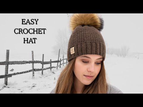 Видео: Как связать крючком шапку с помпоном | ЛЕГКИЙ урок по вязанию крючком