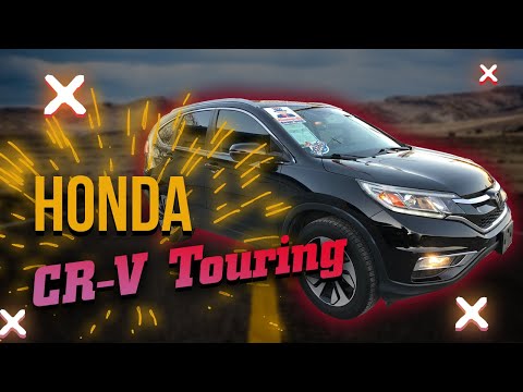 Видео: Обзор Honda CR-V 2015 Touring из США - это вообще машина?