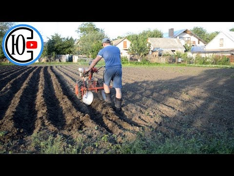 Видео: ОКУЧИВАНИЕ картошки МОТОБЛОКОМ!!! КАК ЭТО??? Работаем с удовольствием!!!