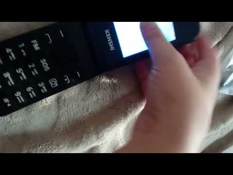 Видео: Распаковка телефона KENSHI F241 извините что она повернулась