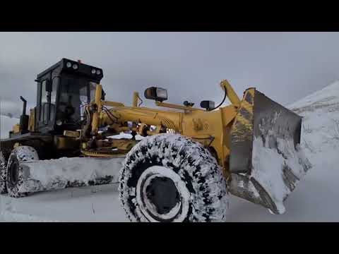 Видео: Работа грейдера в экстремальных условиях.