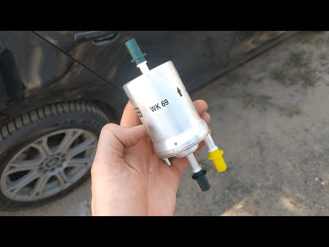 Видео: Замена топливного фильтра JETTA 6