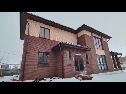 Видео: Дом облицовка кирпич.
