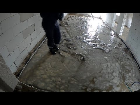 Видео: 58.  Полы по грунту. Обратная засыпка и уплотнение песка водой.