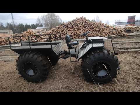 Видео: Выход с воды на лёд и обзор вездехода на шинах КрАЗ