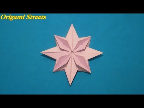 Видео: Оригами звезда из бумаги. Как сделать цветок звезду из бумаги