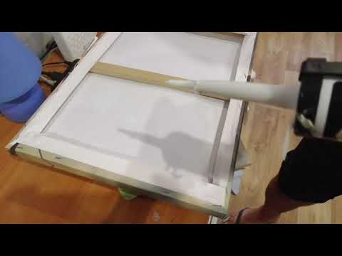 Видео: Как повесить модульную картину.