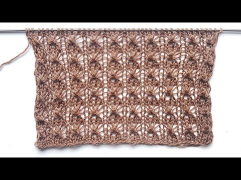 Видео: Узор с объемными узелками на полотне для вязания шапок, свитеров, палантинов