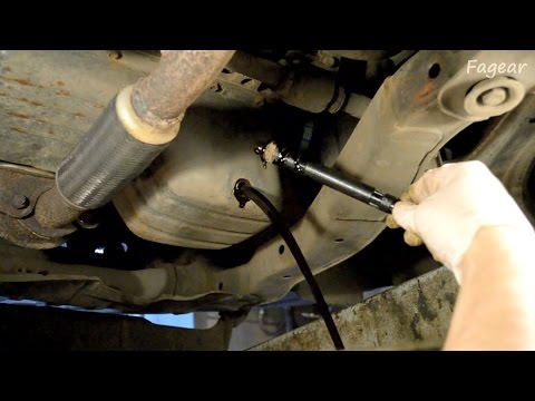 Видео: Замена моторного масла на Hyundai Accent