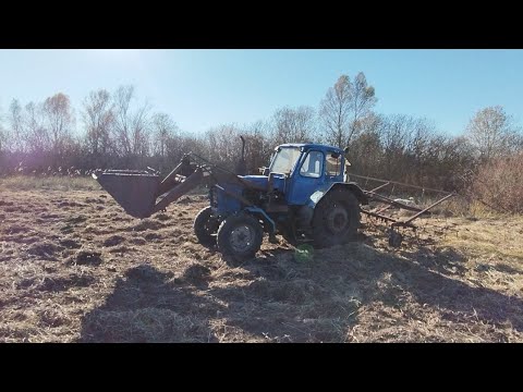 Видео: Боронуем поле на мтз 80