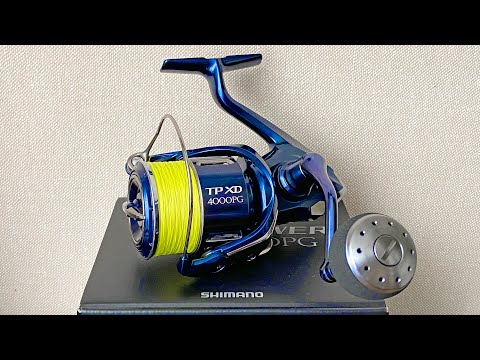 Видео: Хэви катушка Shimano 21 TWIN POWER XD 4000PG - весом 242 грамма, ОФИГЕТЬ!