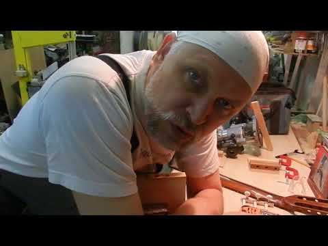 Видео: Отверстия под колковую механику гитары