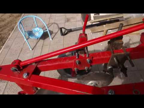 Видео: Регулировка польского  плуга на китайском минитракторе