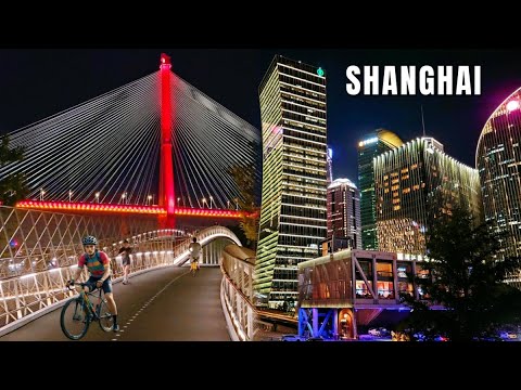Видео: Самый потрясающий веломаршрут по панораме города Китая! Великолепная набережная Шанхая