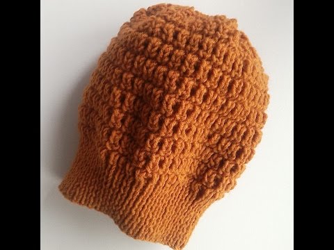 Видео: Вязаная шапка спицами. Женская шапка. Красивый узор.