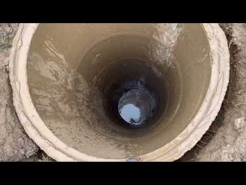 Видео: Углубление колодца машиной
