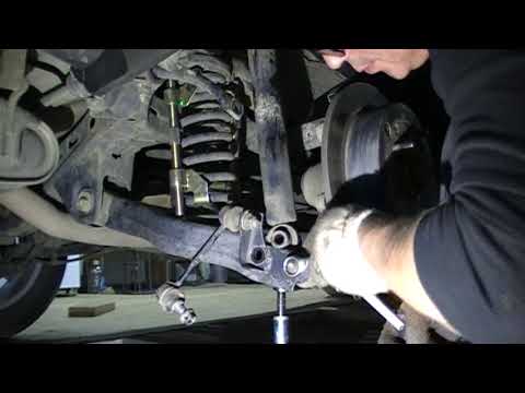 Видео: Kia Sportage (замена задних пружин)