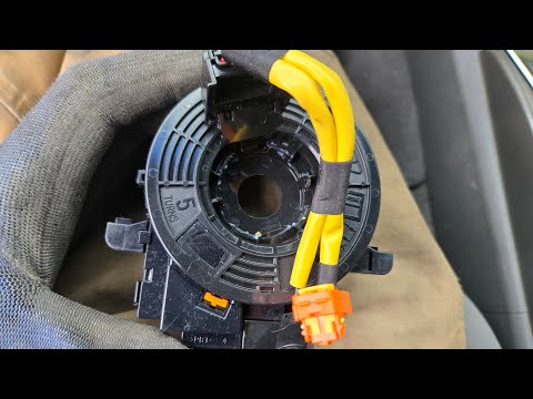 Видео: Снятие рулевого колеса, подушки безопасности и часовой пружины Toyota Tacoma 2005 года выпуска