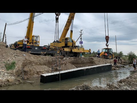 Видео: Монтаж мостового ригеля 30 тонн, двумя автокранами