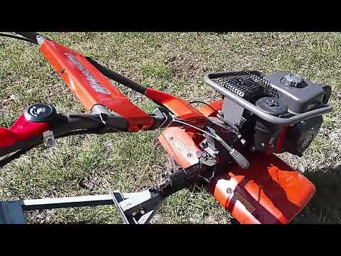 Видео: Культиватор Huskwarna TF230 в работе с навесным оборудованием и с прицепом.