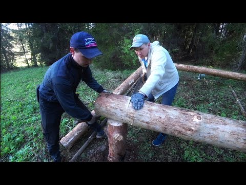 Видео: ИЗБА В ЛЕСУ - часть 2 | ставим столбы под основание