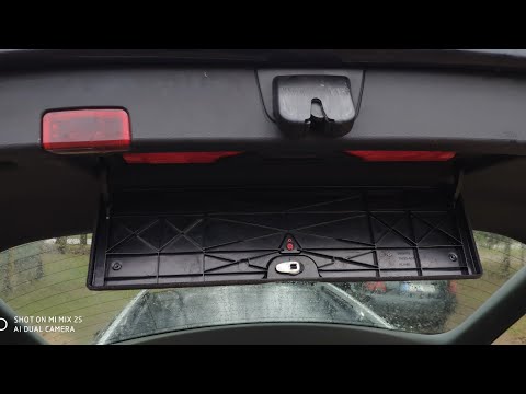 Видео: A4 B6 Фиксатор багажника отражателя.