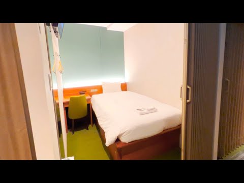Видео: Пребывание в капсульном отеле класса люкс в Японии за 25 долларов | Коттедж в саду Саппоро
