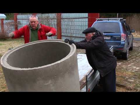 Видео: Как безопасно разгрузить бетонное кольцо 600 кг с прицепа без спецтехники