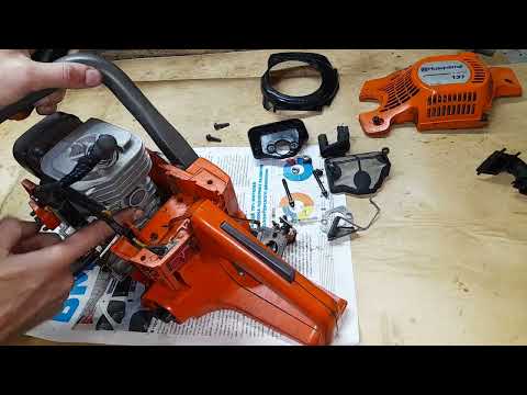 Видео: Замена (установка) резиновых уплотнений на бензопиле Хускварна 137/142