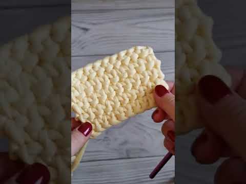 Видео: Плотный узор из трикотажной пряжи и шнура крючком