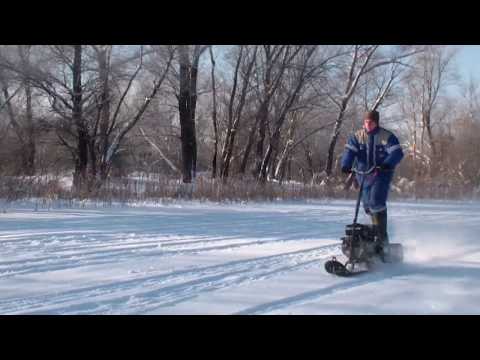 Видео: Гусеничный снегокат "Конь-огонь". Часть 3. Замеры максимальной скорости на разных звездочках.