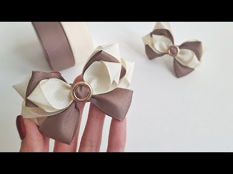 Видео: Просто, быстро, стильно! Бантики из лент