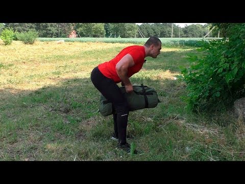 Видео: Тяга сэндбэга в наклоне: техника и нюансы