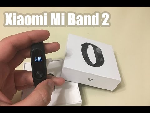 Видео: Xiaomi Mi Band 2 - настройка и полный обзор