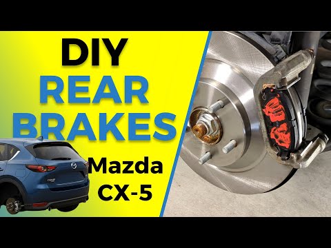 Видео: Замена задних тормозов Mazda CX-5 (колодки и роторы) | 2016-2025