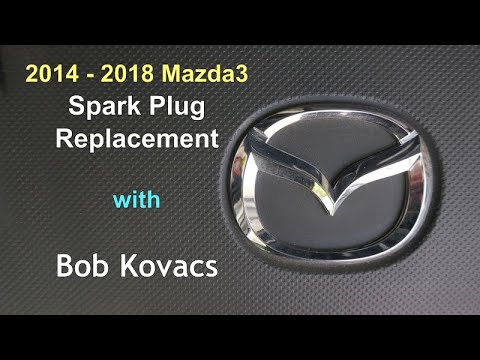Видео: Замена свечей зажигания Mazda3 2014 - 2018
