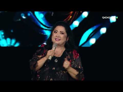 Видео: «Бақыт құшағында» - Мақпал Жүнісова | Шәмші Қалдаяқовтың ән кеші