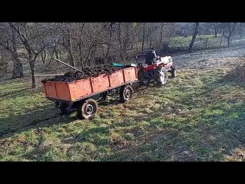Видео: Кубота GL23 з саморобним прицепом везе в гору гній. Розрили весь огород.=) Японський мінітрактор.