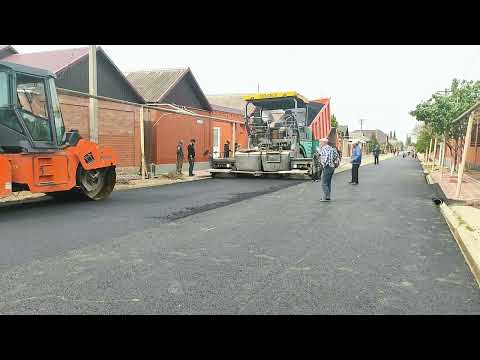 Видео: Укладка асфальта на улице Умарова (Молодежка)