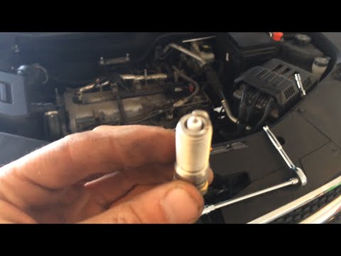 Видео: Как заменить свечи зажигания на Chevrolet Equinox 2012 года