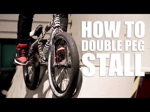 Видео: How to double peg stall BMX - Как сделать дабл пег в радиусе | Школа BMX Online #23