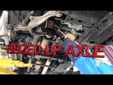 Видео: Снятие вала передней оси Ram 1500