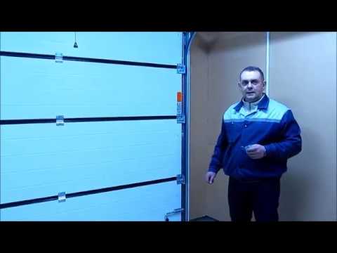 Видео: Монтаж ворот секционных Алютех