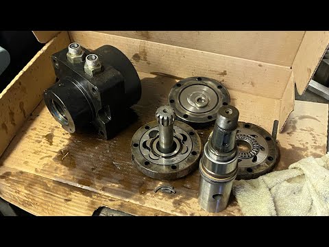 Видео: Диагностика утечки в гидромоторе колеса