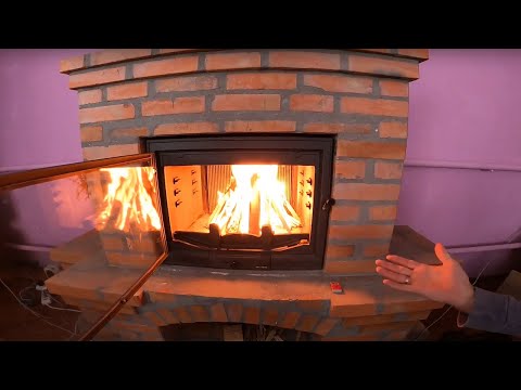 Видео: Кладка камина с чугунной топкой.