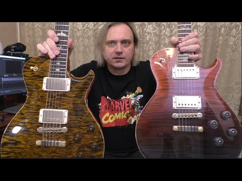 Видео: Обзор на диване - два PRS McCarty 594