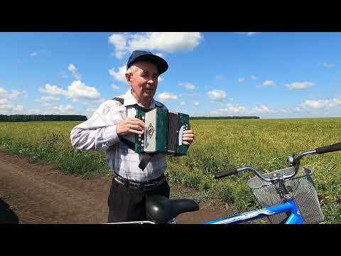 Видео: Еду на велосипеде без рук и играю на гармони. Валерий Талбутдинов.
