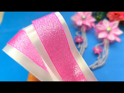 Видео: DIY/ ЛУЧШИЕ НОВОГОДНИЕ бантики.  ПРОСТАЯ идея, как сделать красивые банты из атласа и парчи/hair bow