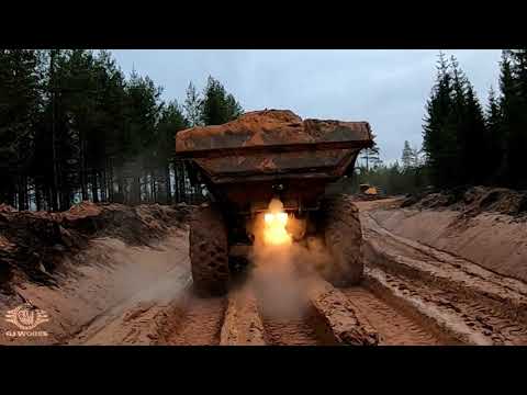 Видео: Первые грузовики с песком